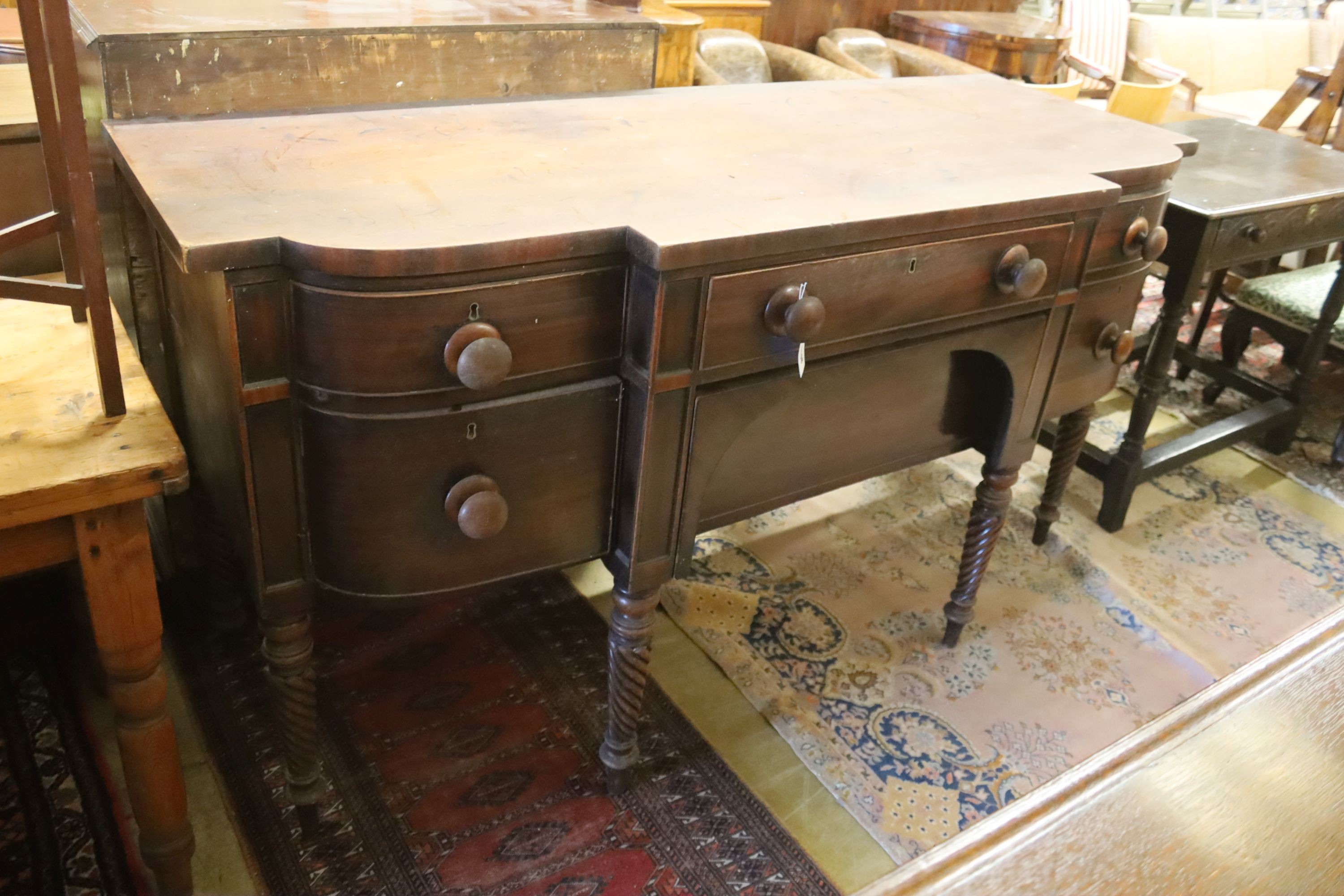 A George IV mahogany bow front sideboard, width 183cm, depth 71cm, height 94cm